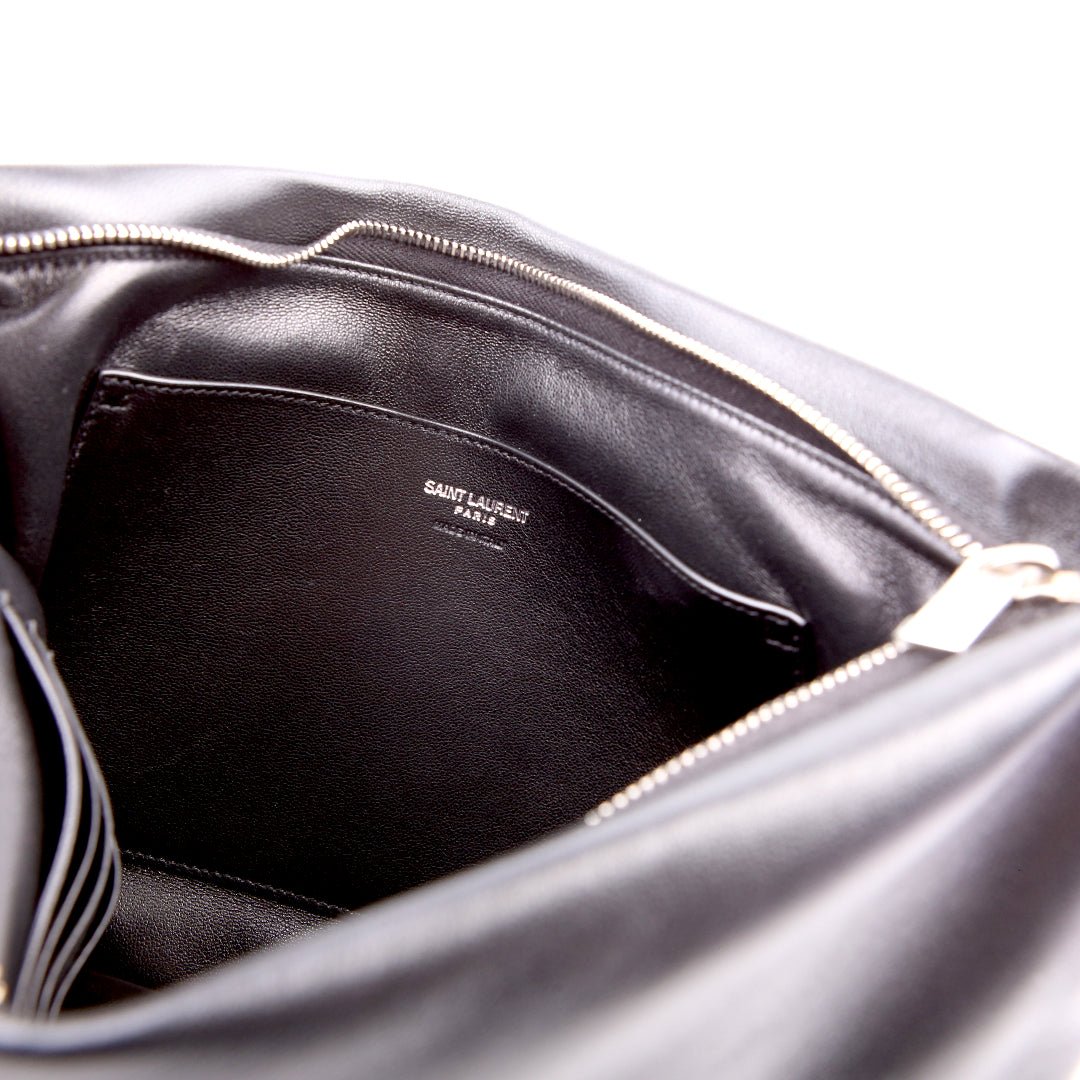 Saint Laurent Large Puffy Pouch in black lambskin, heat-stamped brand logo